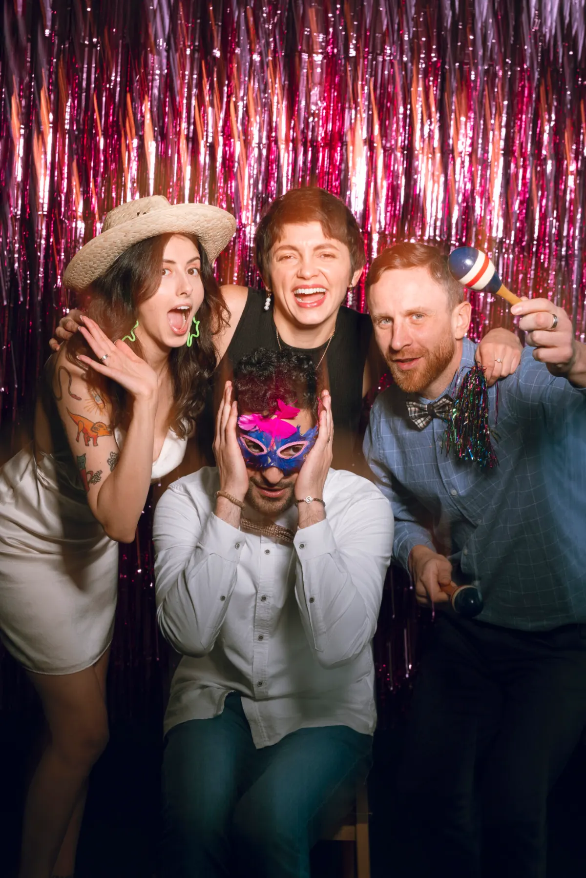 Friends with party props at a celebration